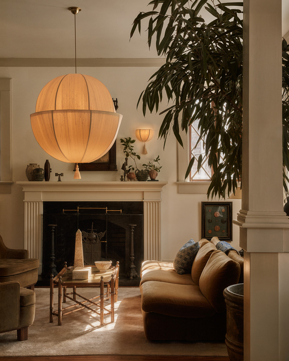 large illuminated raw silk pendant in a beautiful home